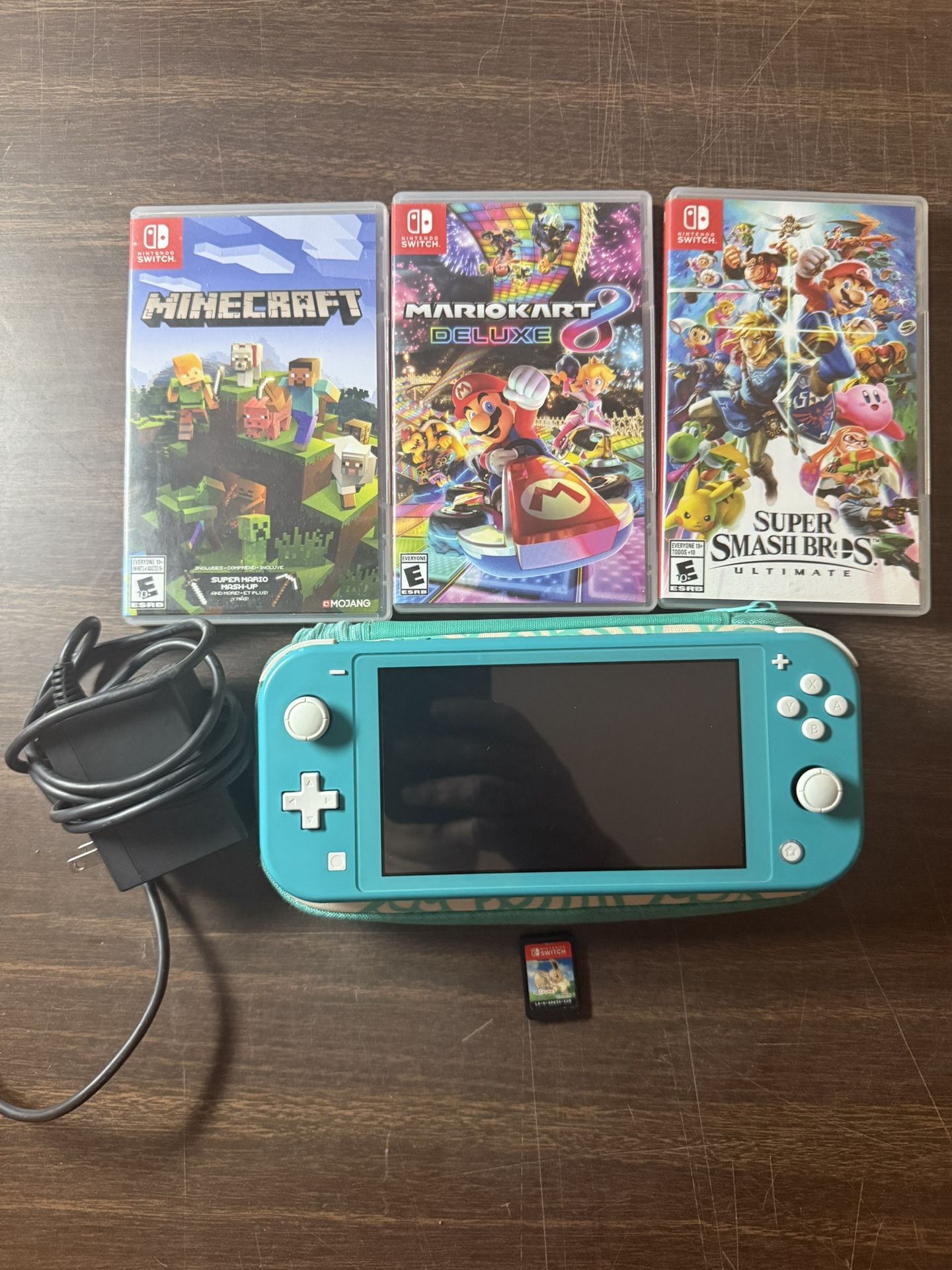 Nintendo Switch Lite HDH-001 w/Super Smash, Mario cart 8, Minecraft, Pokémon