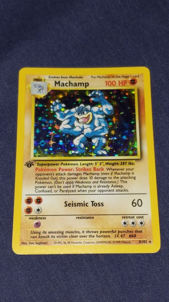 Machamp 1st edition holo 8/102 great condition.