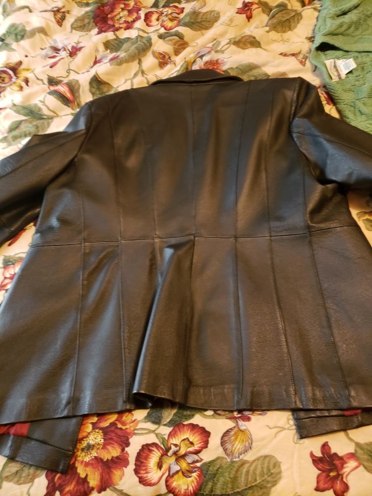 Womens leather coat, asking $85.00 or best offer, size xlarge, very slimming look