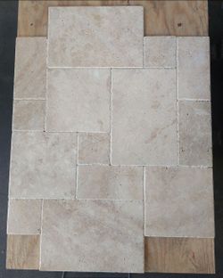 624 square feet French Pattern Travertine Stone.