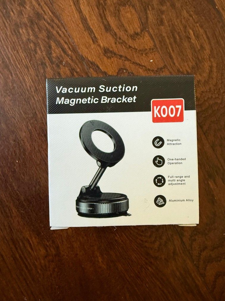A magnetic phone mount with vacuum suction capabilities.