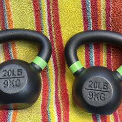 PAIR  OF  20  LB.  KETTLEBELLS    •  25s   30s  35s  Also  Available
