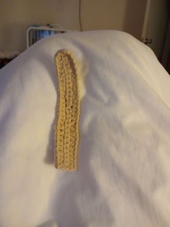 A cute little light brown bookmark
