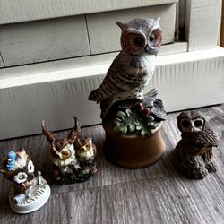 3 Small Owl Figurines And One Large Owl Music Box Figurine