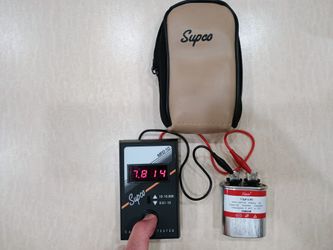 Supco capacitor analyzer. Range from 0.01-MFD to 999 MFD. Works perfectly.
