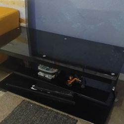 Sleek Black Glass Entertainment Center - TV Stand