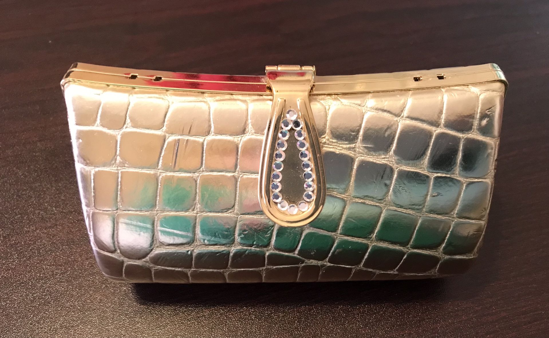 Woman’s Small Gold Clutch. 