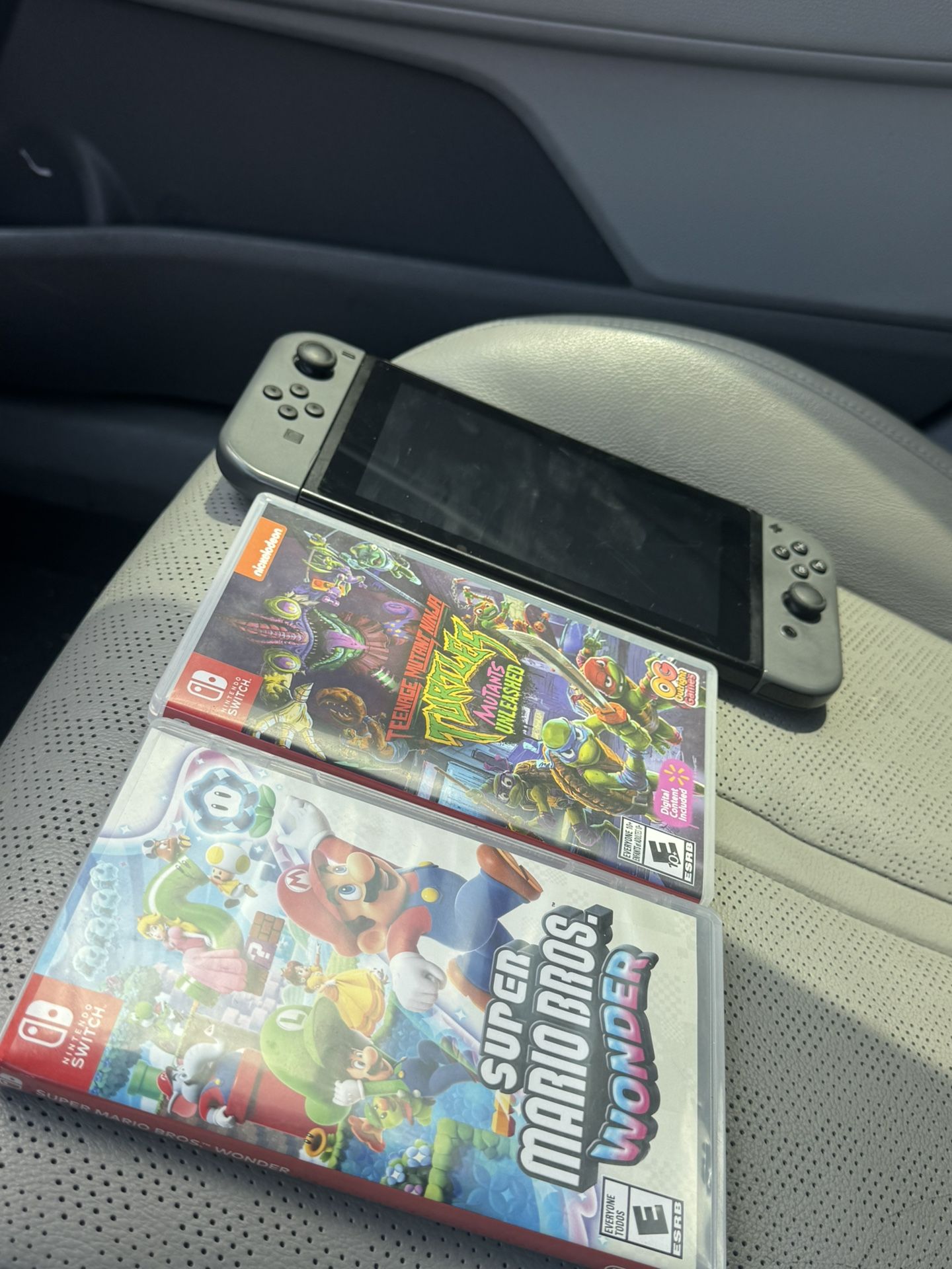 Nintendo switch and two games