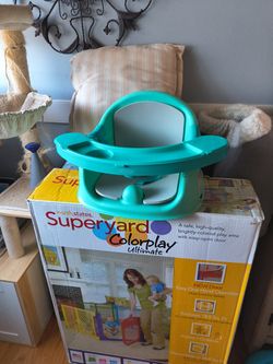 Booster And Floor Seat Never Used 