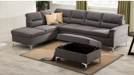 Gray sectional with Ottoman