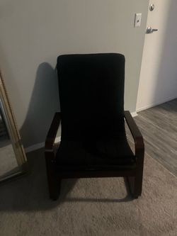 Black Upholstered Armchair with Wood Frame