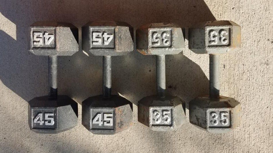 DUMBBELLS 45 POUND AND 35 POUND SETS
