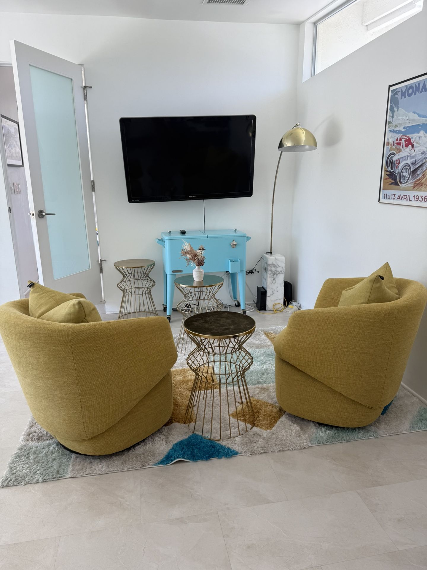 Two mid Century Modern Swivel Chairs 