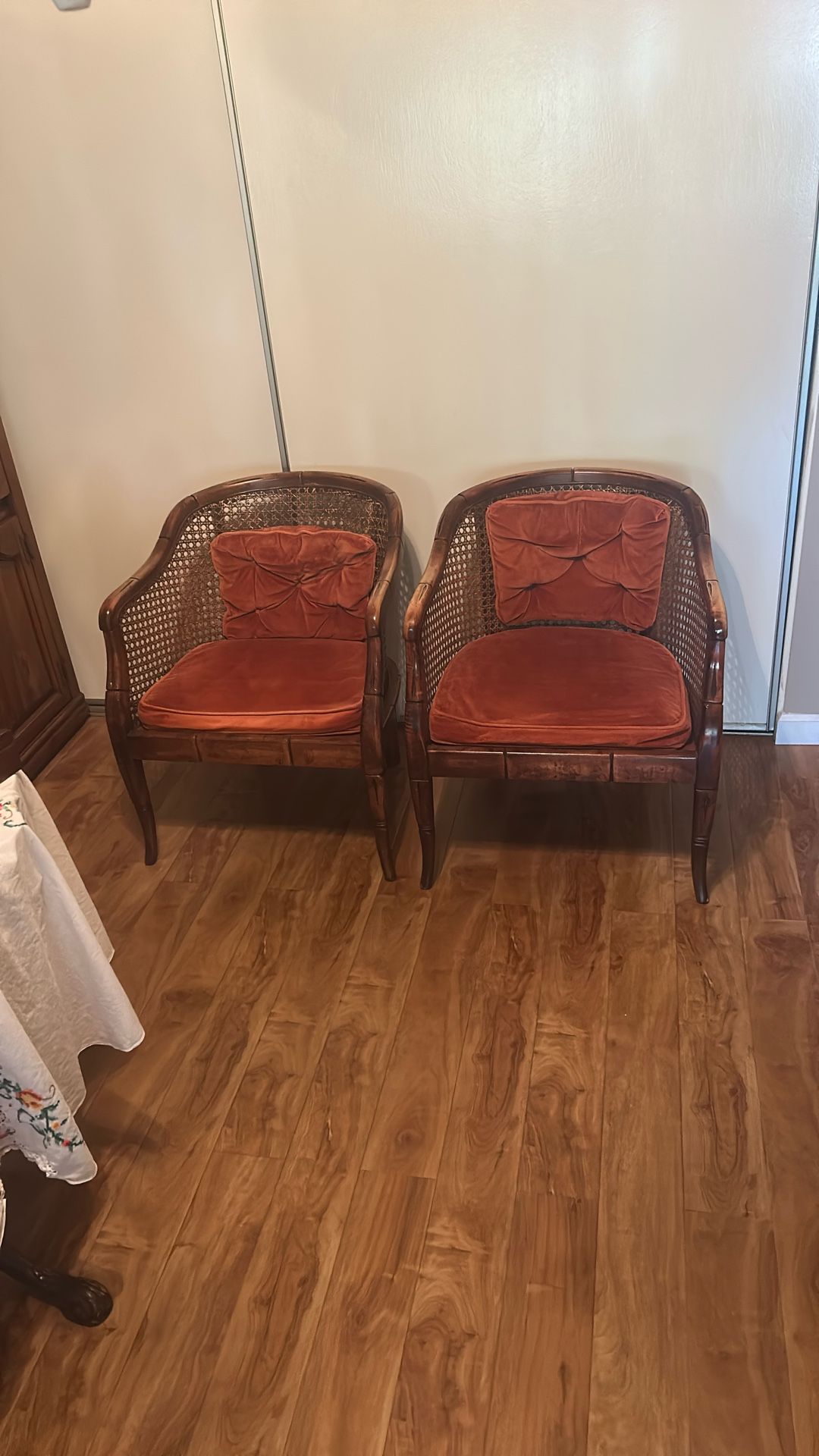 Old comfortable vine chair sofa pair