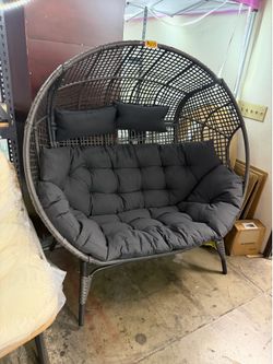 New assembled double eggs chair with dark gray cushion.