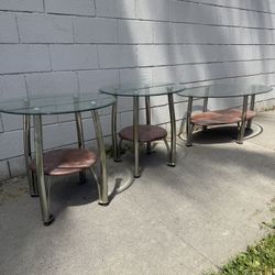 3 Glass And Wood Tables (sold As Set)