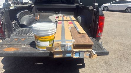100 sf of hardwood floor and glue
