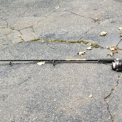 Deep sea 9 feet fishing pole with reel see pictures