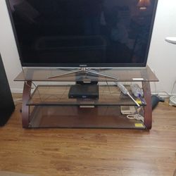 SAMSUNG 55 INCH  TV AND GLASS TV STAND 