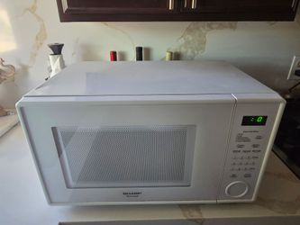 Sharp carousel microwave used condition works good