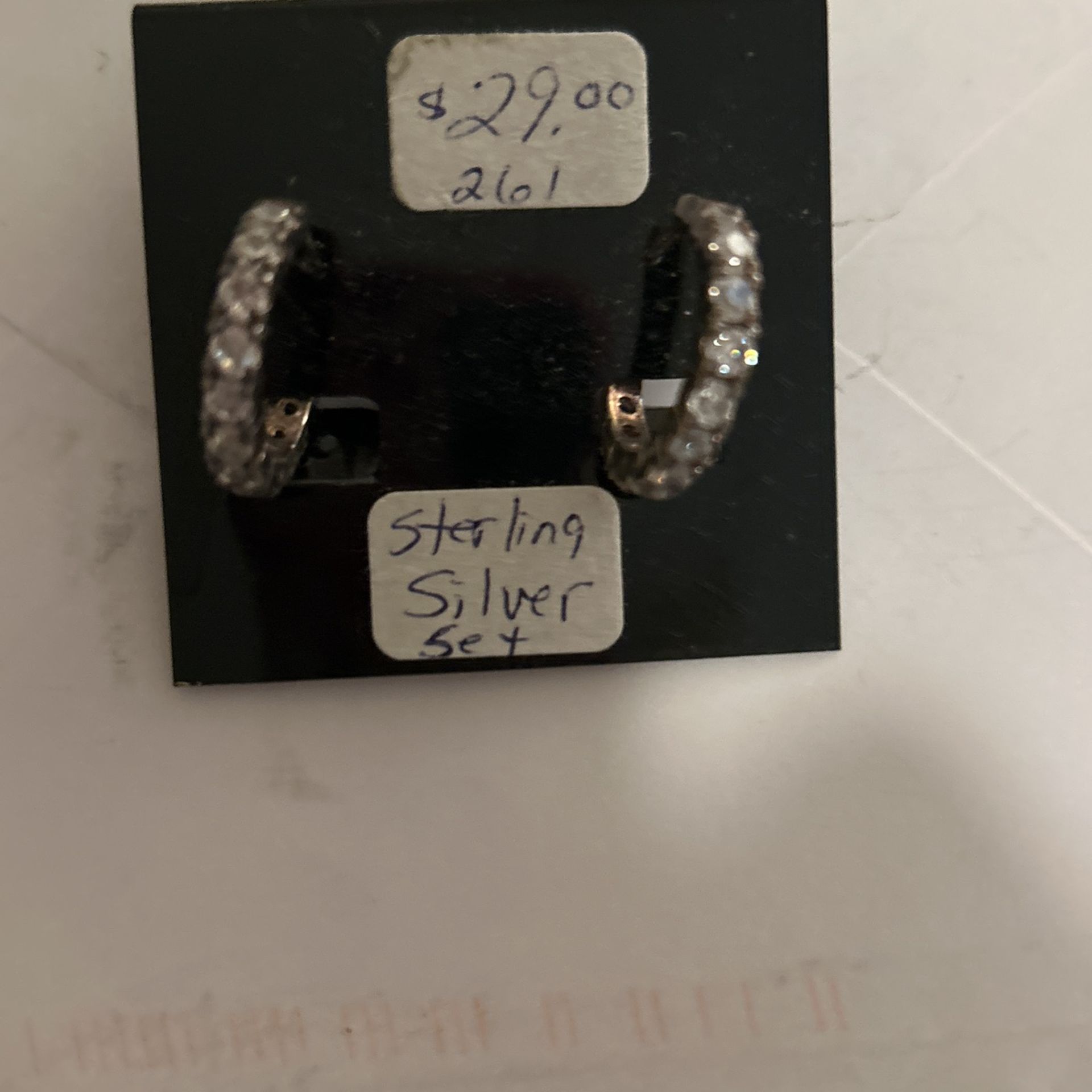 1 Pair Of Sterling Silver Earrings With Stones All Around