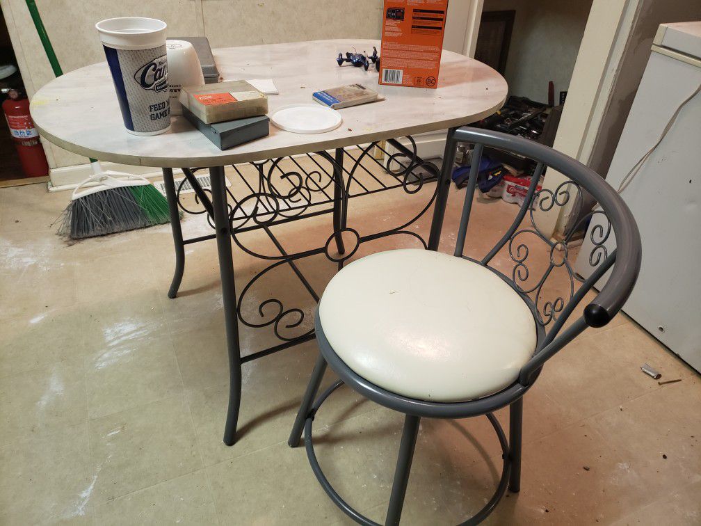 Small kitchen table with 1 chair..