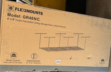 Height adjustable ceiling storage