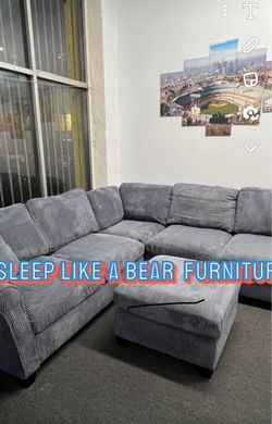 Dark gray sectional sofa with ottoman new in box