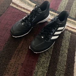9.5’ Adidas Baseball Cleats