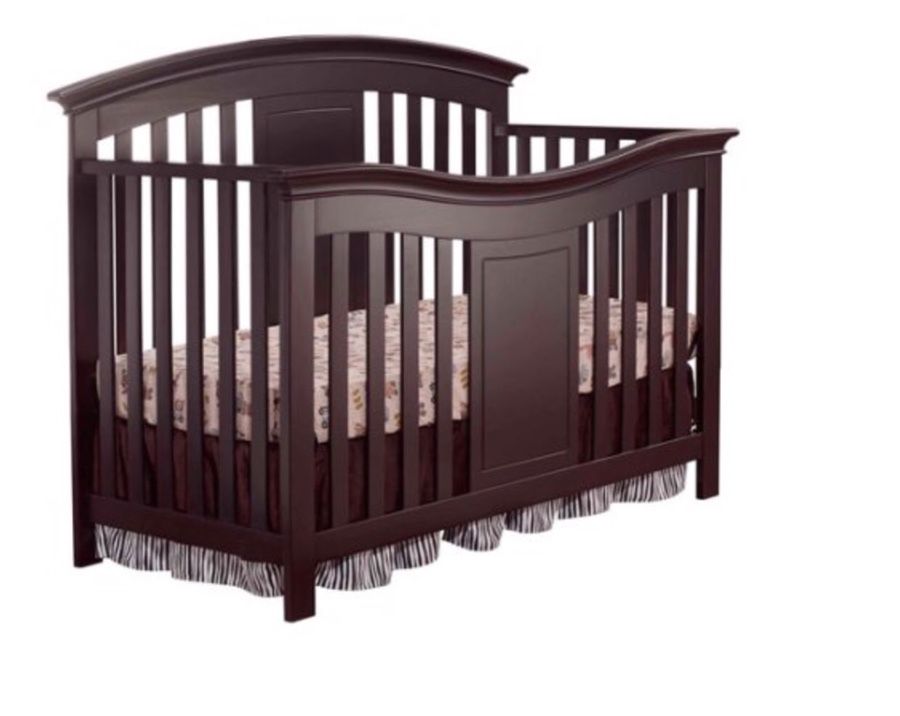 Baby crib in a box used but looks new and brand new in abox