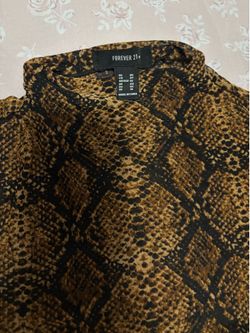 Blusa leopardo