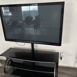 Panasonic 60 in with Tv stand 
