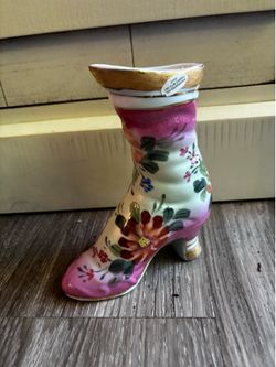 Antique vintage collectible ceramic shoe shoe is about 6”tall