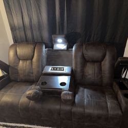 3 seat recliner sofa , with usb outlets as well as plug in and a light 