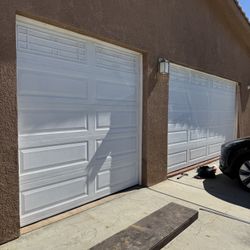 two garage doors hardly used