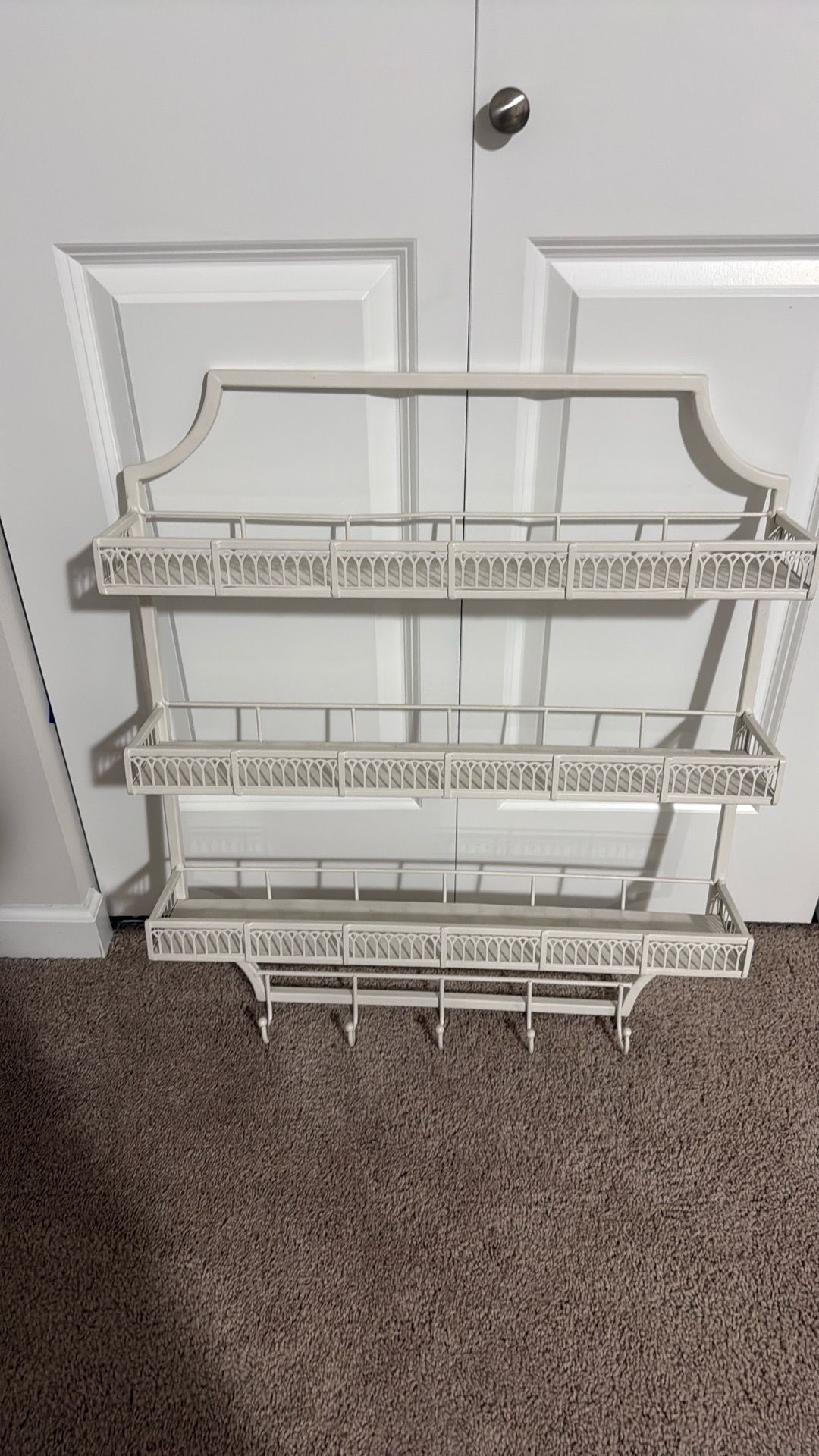 White painted metal vanity shelves