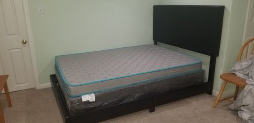Full size bed with frame mattress & brand NEW box. This Is BRAND NEW Never Used .