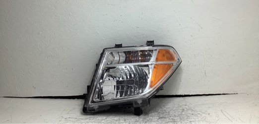 2009-2021 Nissan Frontier left headlight (2F)