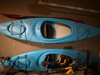 2 Blue Kayaks w/ paddle