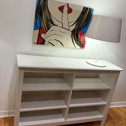 white wooden bookshelf / storage console** (bookcase** or **open shelving unit**).