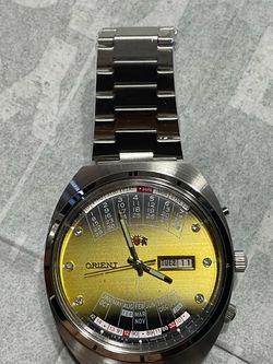 watch orient calendar perpetual gold color year 80s automatic 21 jewels old but in new condition works perfect ——— Reloj orient calendario perpetual c