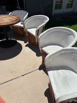 Wooden table with 4 hide chairs