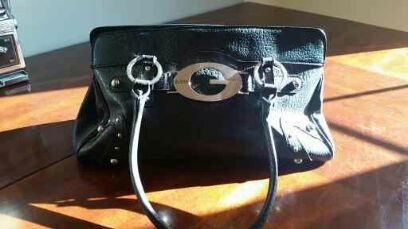 Black leather Guess purse