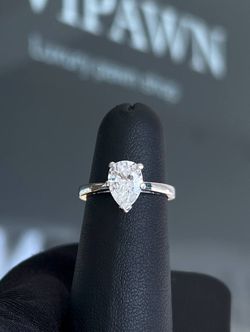Platinum pear diamond solitaire lady’s ring