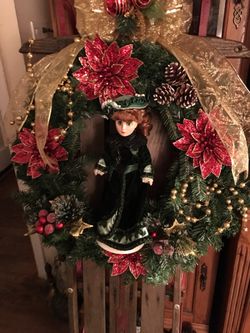 Vintage Flexible Flyer Sled newly decorated. Wreath lites up. Doll is just an embellishment.