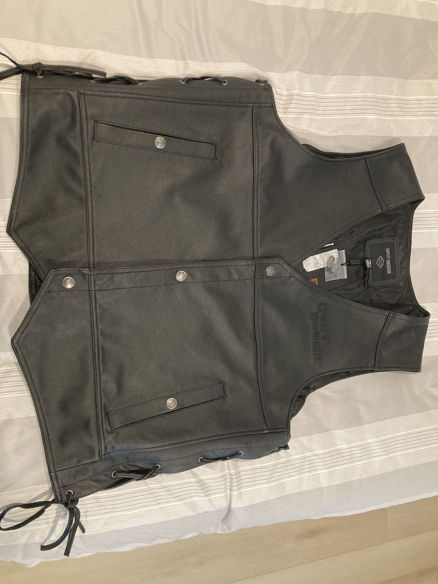 Brand New Leather Vest From Harley ordered it online then it was the wrong size never won. Laconia is around the corner $100. It’s a two XL.