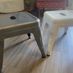 Two metal footstools