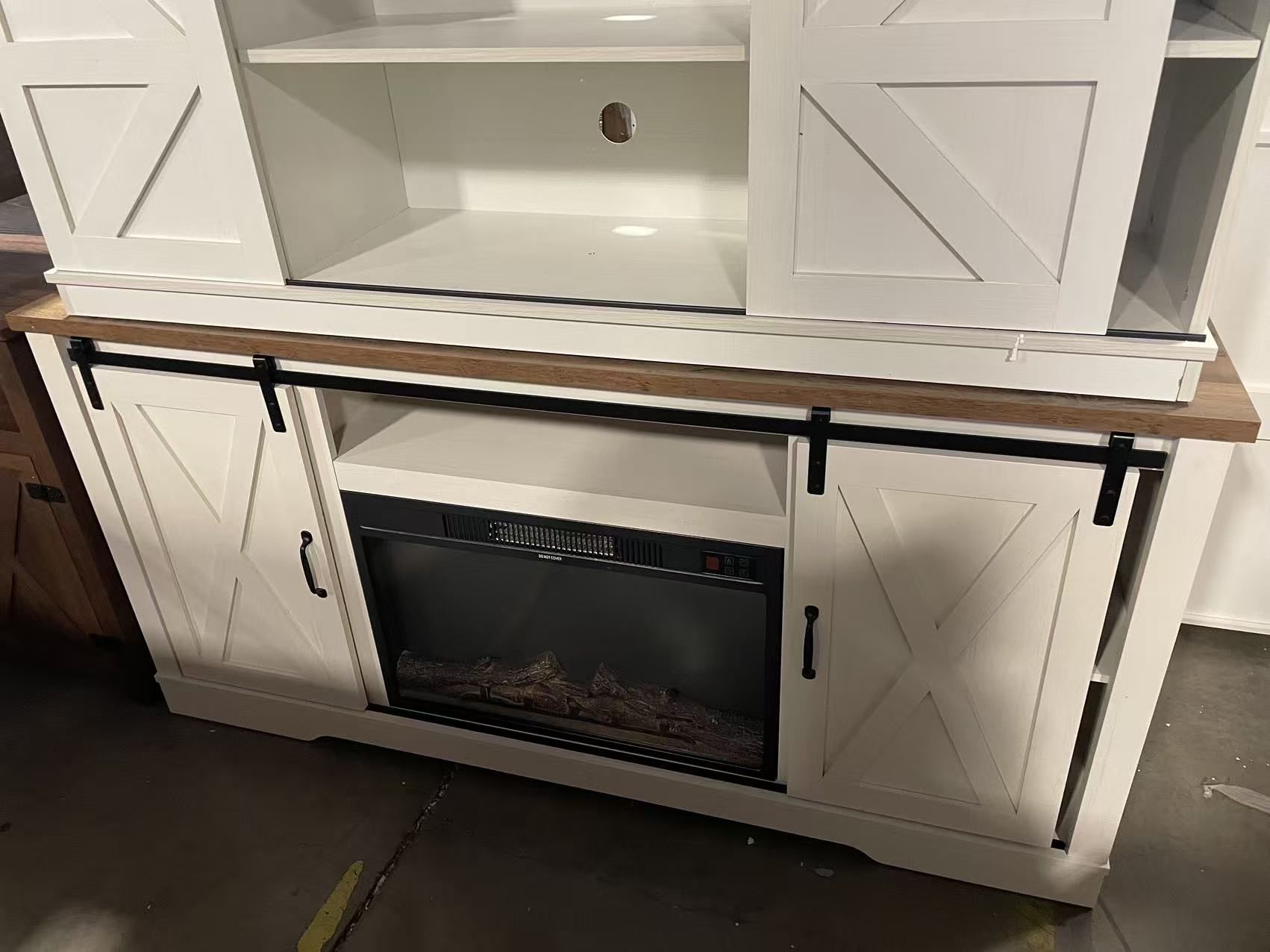 Fireplace TV Stand with Sliding Barn Door for TVs up to 65 $200