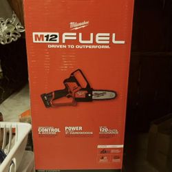 MILWAUKEE FUEL CHAINSAW KIT NEW FIRM