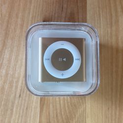 iPod Shuffle 2GB. Gold. Never Opened! 